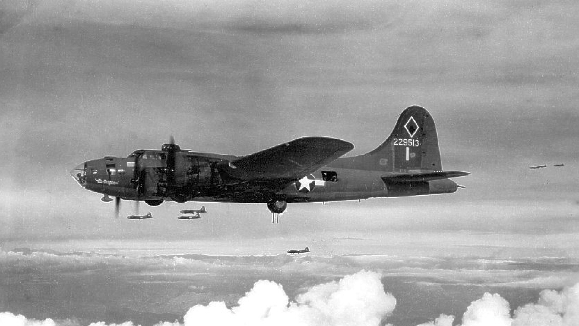 a photo of a B17 bomber in flight